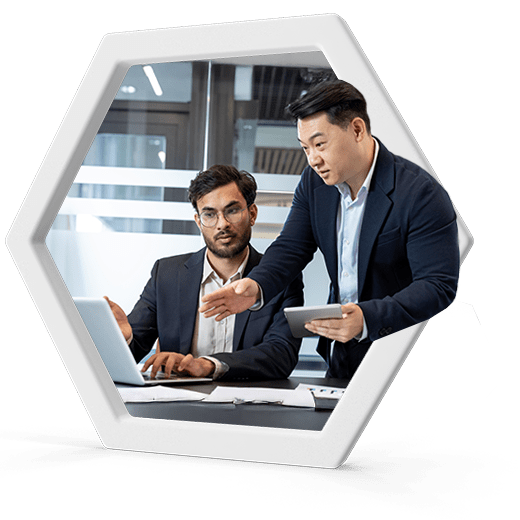 Two financial professionals discussing strategy at Afinida Accounting, providing expert fractional CFO services for small businesses.